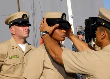 Flickr - Official U.S. Navy Imagery - A new chief receives her combination cover. (1)