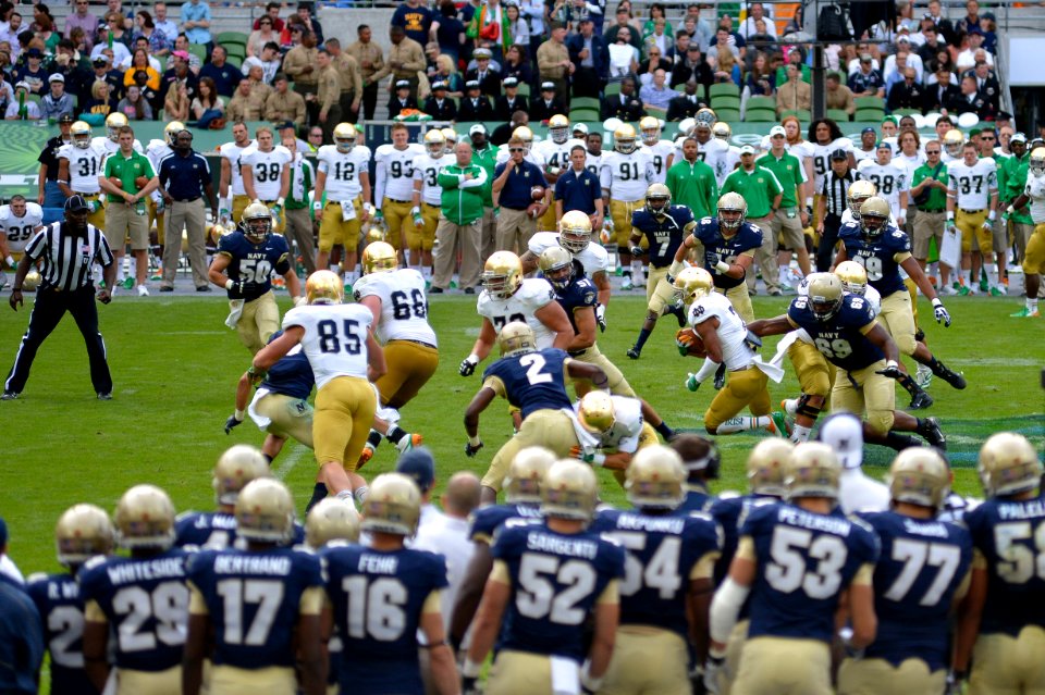 Flickr - Official U.S. Navy Imagery - A Notre Dame player breaks a tackle.