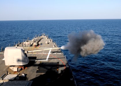 Flickr - Official U.S. Navy Imagery - A MK-45 5-inch light-weight gun is fired during a live-fire exercise aboard the Arleigh Burke-class guided-missile destroyer USS Momsen. photo