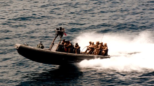 Flickr - Official U.S. Navy Imagery - A rigid-hull inflatable boat operated by Sailors. approaches the Military Sealift Command fleet replenishment oiler