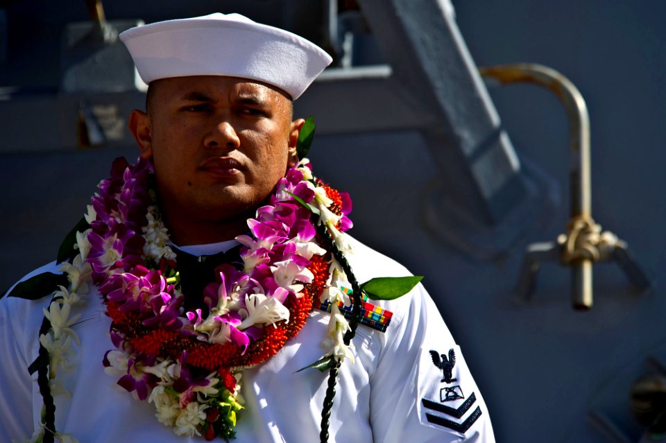 Flickr - Official U.S. Navy Imagery - A Sailor aboard USS O'Kane mans the rails as the ship departs Joint Base Pearl Harbor-Hickam.