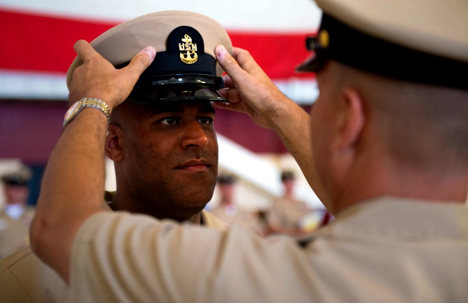 Flickr - Official U.S. Navy Imagery - A new chief receives his combination cover. (6)