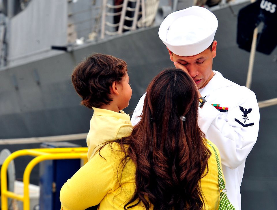 Flickr - Official U.S. Navy Imagery - A Sailor says goodbye to his family before boarding USNS Mercy.