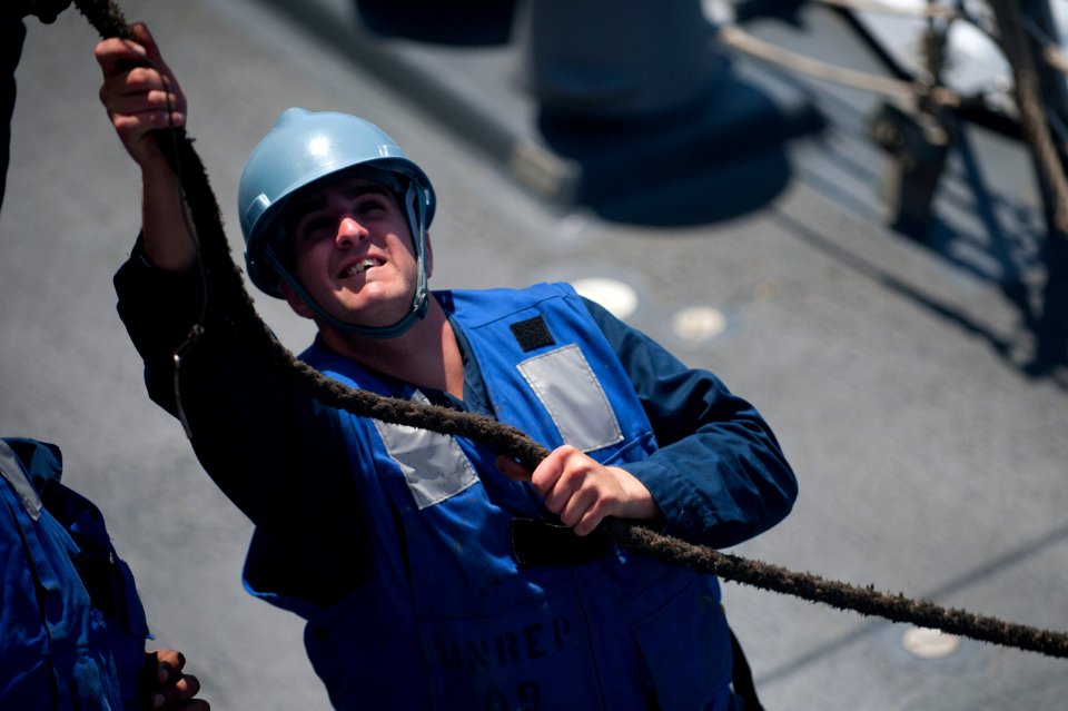 Flickr - Official U.S. Navy Imagery - A Sailor secures line to the trolley during an underway replenishment.