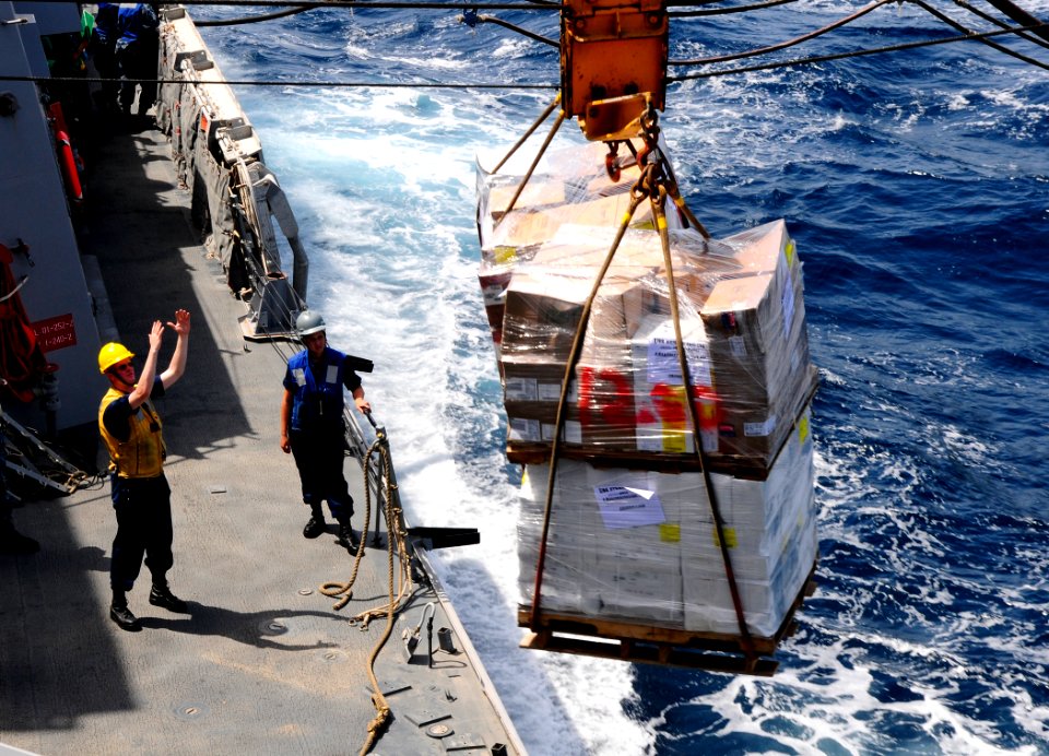 Flickr - Official U.S. Navy Imagery - A Sailor signals a cargo pallet across a phone and distance line during a replenishment-at-sea. (1)