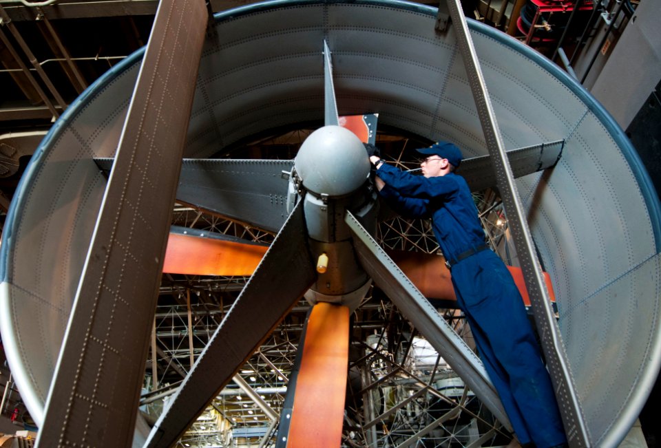 Flickr - Official U.S. Navy Imagery - A Sailor conducts maintenance on an LCAC propellor.