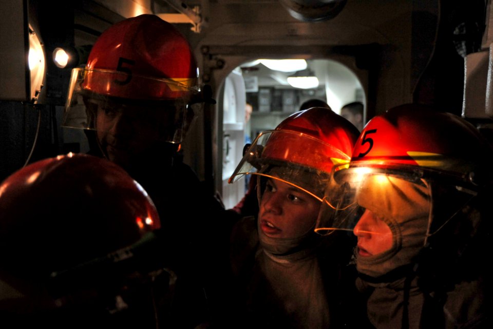 Flickr - Official U.S. Navy Imagery - A Sailor assess simulated flooding damage during a damage control flooding drill.