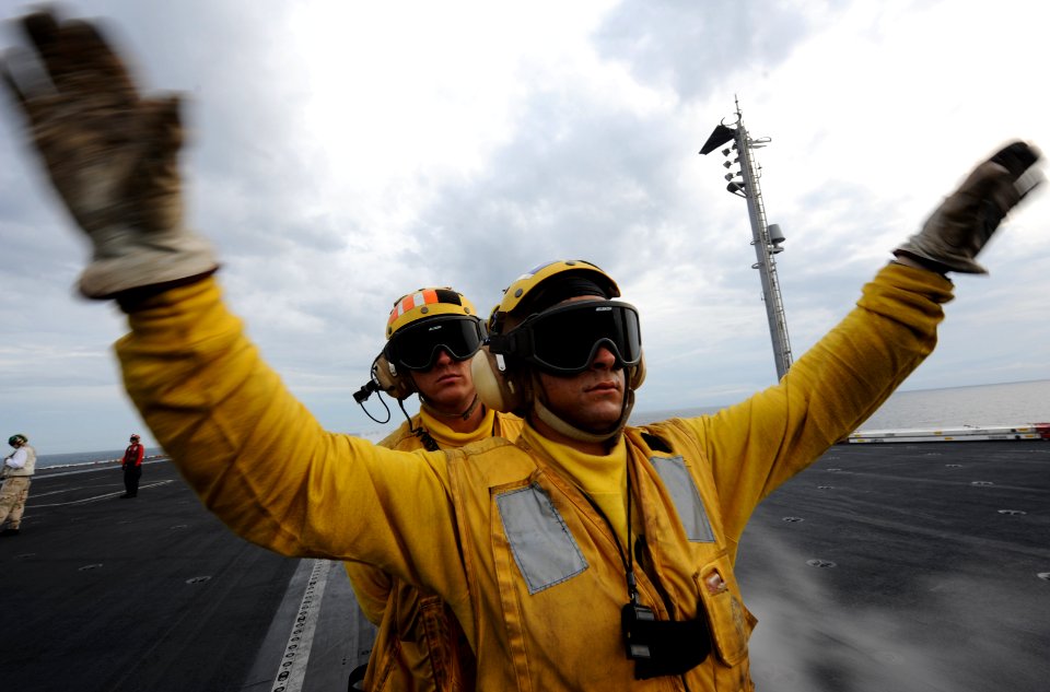 Flickr - Official U.S. Navy Imagery - A Sailor directs a fixed-wing aircraft. (1)