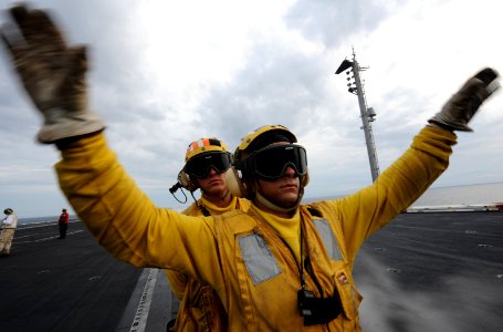 Flickr - Official U.S. Navy Imagery - A Sailor directs a fixed-wing aircraft. (1)