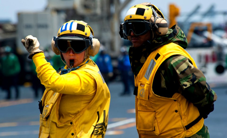Flickr - Official U.S. Navy Imagery - A Sailor directs an aircraft on the flight deck.