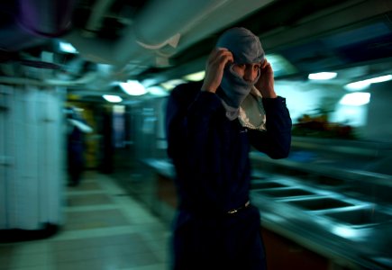 Flickr - Official U.S. Navy Imagery - A Sailor dons flash gear.
