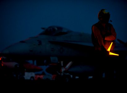 Flickr - Official U.S. Navy Imagery - A Sailor waits to direct aircraft onto the waist catapults aboard USS Carl Vinson.