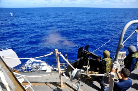 Flickr - Official U.S. Navy Imagery - A Sailor fires a .50 caliber machine gun during a live-fire exercise.