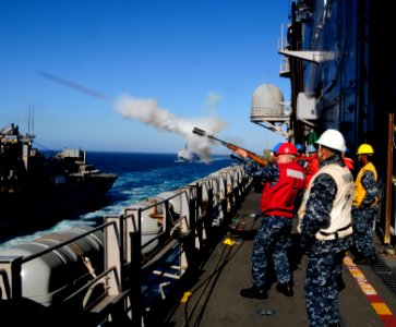 Flickr - Official U.S. Navy Imagery - A Sailor fires a shot line. (2)