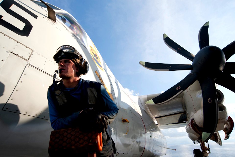 Flickr - Official U.S. Navy Imagery - A Sailor helps move an aircraft.
