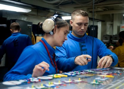 Flickr - Official U.S. Navy Imagery - A Sailor learns how to monitor flight operations.