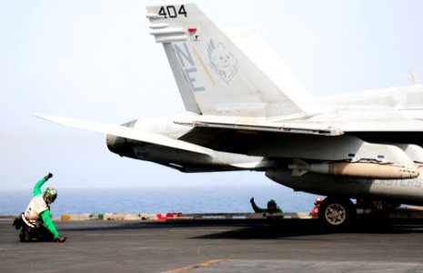 Flickr - Official U.S. Navy Imagery - A Sailor is ready to launch from the flight deck.