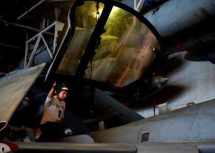 Flickr - Official U.S. Navy Imagery - A Sailor guides the canopy of an EA-6B Prowler.