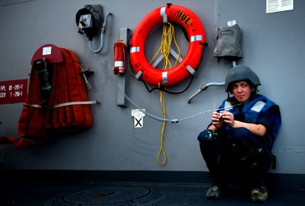 Flickr - Official U.S. Navy Imagery - A Sailor mans the internal voice communication system aboard USS Gridley.