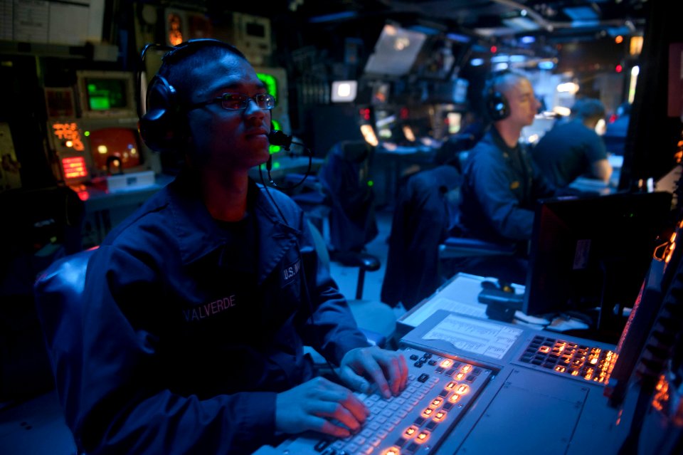 Flickr - Official U.S. Navy Imagery - A Sailor mans a surface warfare supervisor console in the combat information center.
