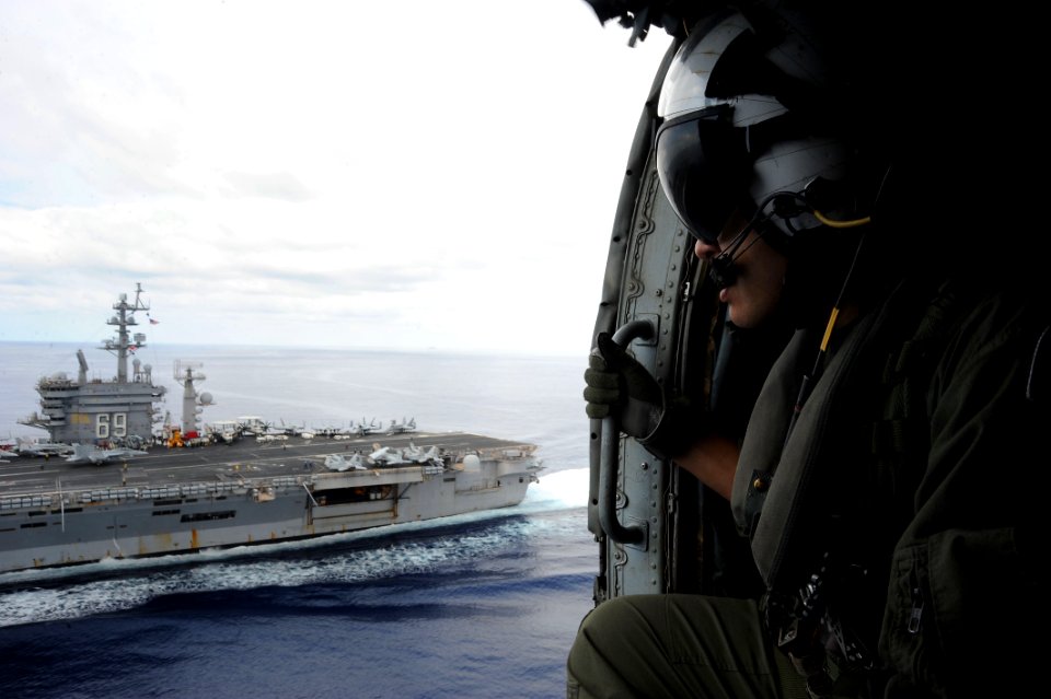 Flickr - Official U.S. Navy Imagery - A Sailor observes flight deck operations on USS Dwight D. Eisenhower.