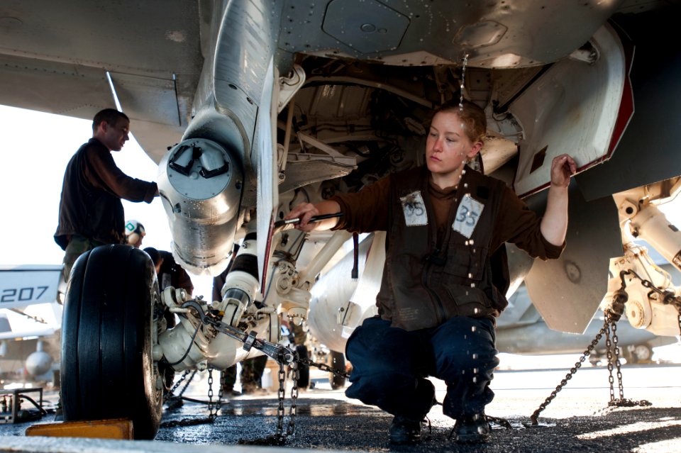 Flickr - Official U.S. Navy Imagery - A Sailor performs corrosion control.