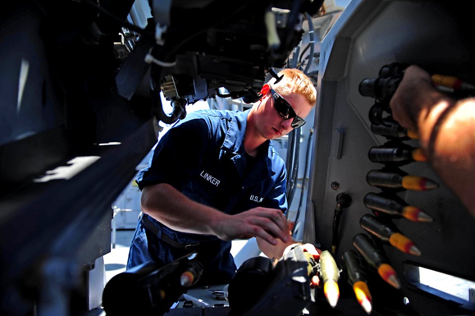 Flickr - Official U.S. Navy Imagery - A Sailor performs maintenance on an MK-38 25 mm machine system