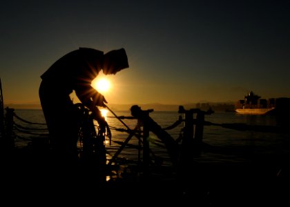 Flickr - Official U.S. Navy Imagery - A Sailor prepares a heaving line.