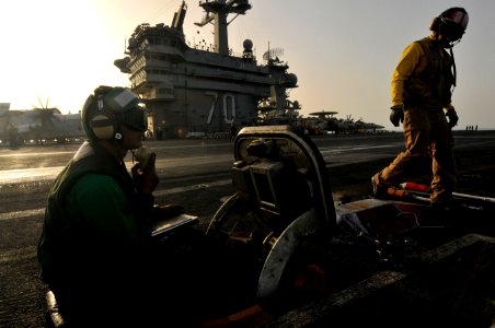 Flickr - Official U.S. Navy Imagery - A Sailor prepares the waist catapults to launch aircraft. photo
