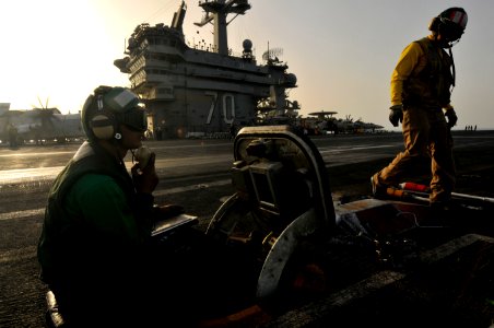 Flickr - Official U.S. Navy Imagery - A Sailor prepares the waist catapults to launch aircraft.