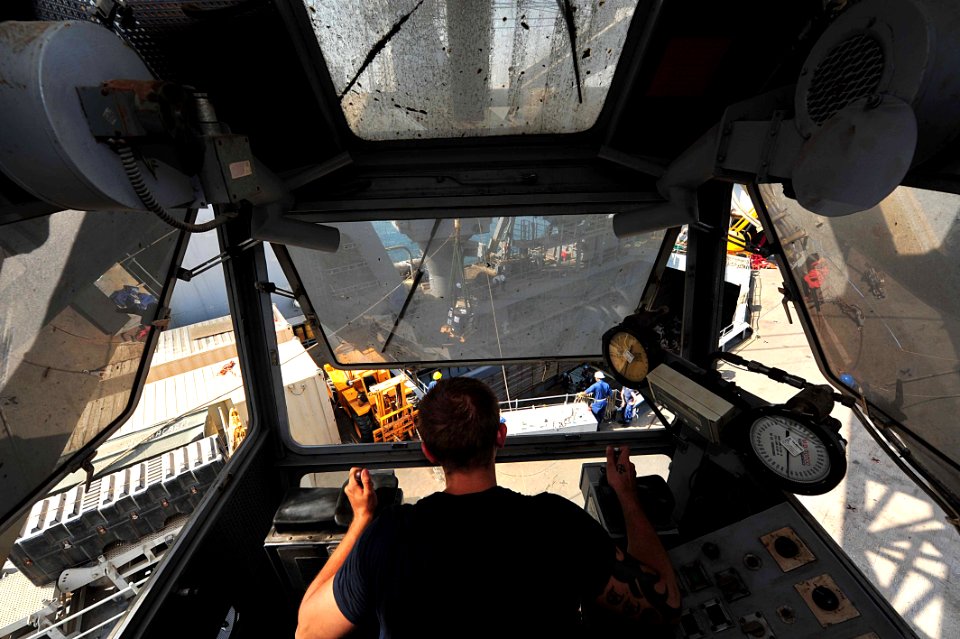 Flickr - Official U.S. Navy Imagery - A Sailor operates a crane during well deck operations.