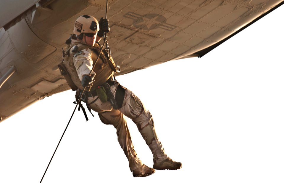 Flickr - Official U.S. Navy Imagery - A Sailor rappels from a helicopter.