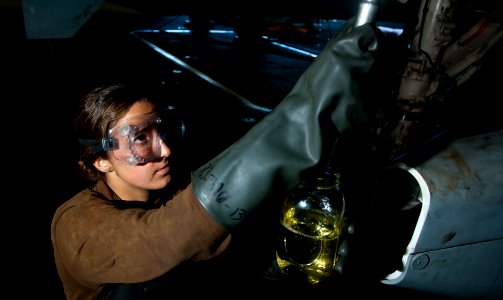 Flickr - Official U.S. Navy Imagery - A Sailor takes a fuel sample.