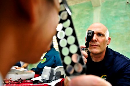 Flickr - Official U.S. Navy Imagery - An officer checks the strength of a pair of eye glasses.