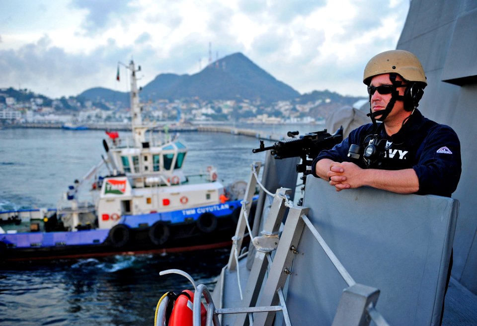 Flickr - Official U.S. Navy Imagery - A Sailor stands watch at a gun mount aboard USS Independence.
