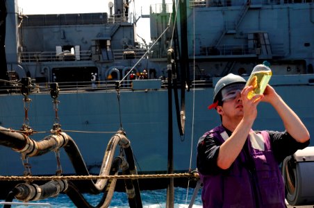 Flickr - Official U.S. Navy Imagery - A Sailor tests fuel.