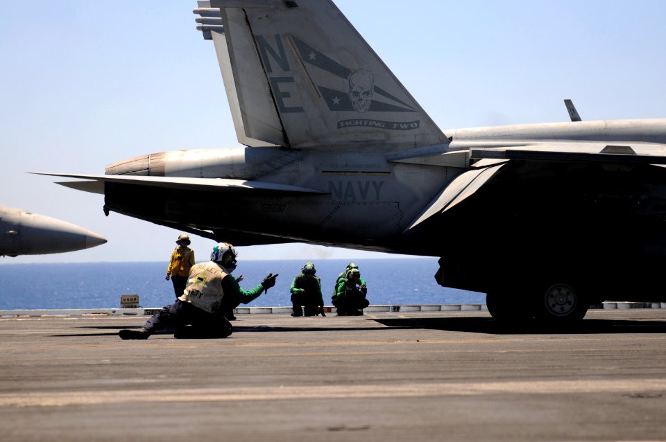 Flickr - Official U.S. Navy Imagery - A Sailor signals ready for launch.