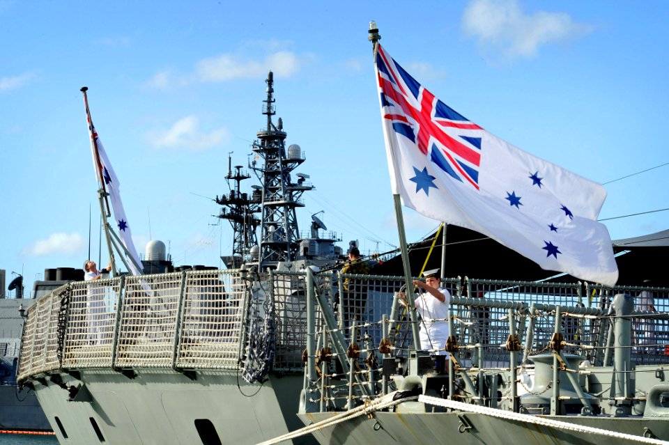 Flickr - Official U.S. Navy Imagery - Australian sailors raise the colors aboard HMAS Darwin.