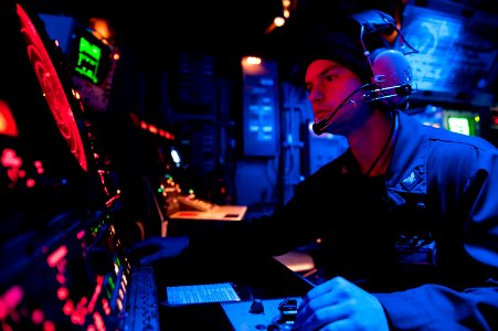 Flickr - Official U.S. Navy Imagery - A Sailor stands watch in CIC.