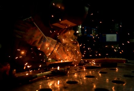 Flickr - Official U.S. Navy Imagery - A Sailor welds a bracket in the sheet metal shop. (1) photo