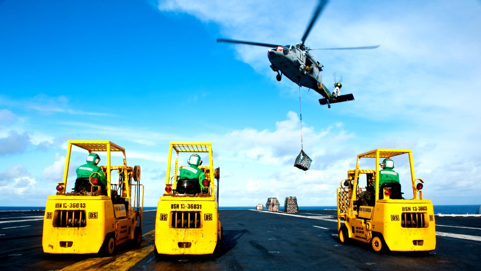 Flickr - Official U.S. Navy Imagery - A Sea Hawk helicopter delivers supplies.