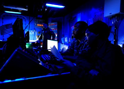 Flickr - Official U.S. Navy Imagery - A Sailor track contacts in the combat direction center.