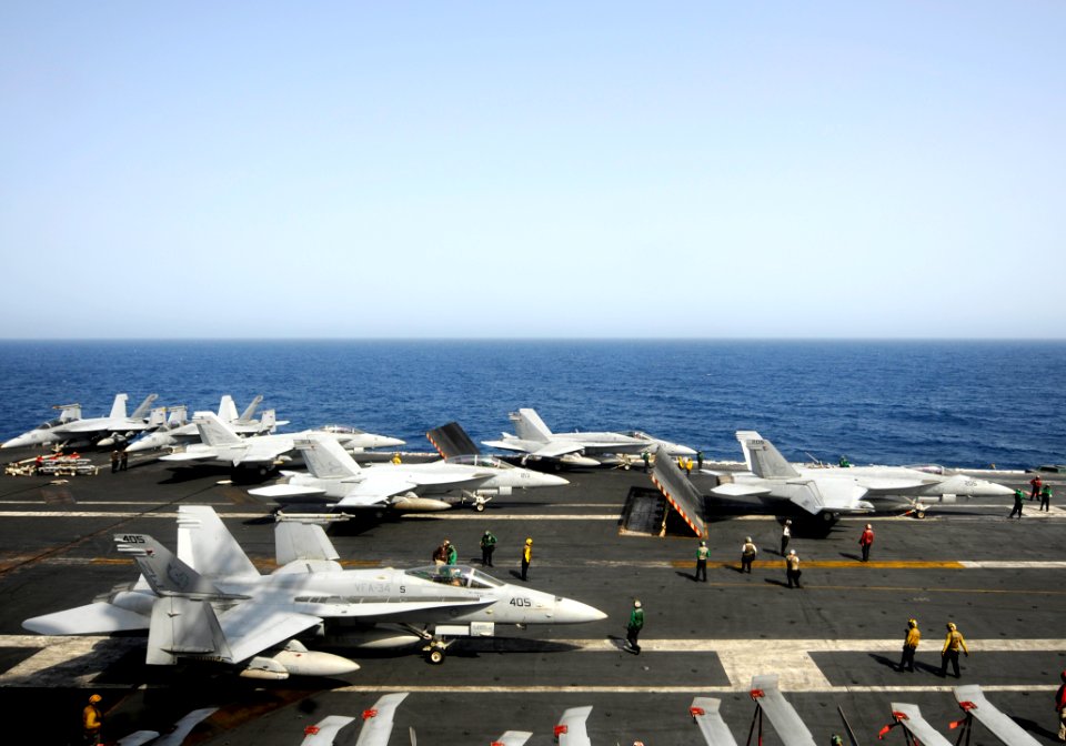 Flickr - Official U.S. Navy Imagery - Aircraft line up for takeoff on the flight deck of USS Abraham Lincoln.