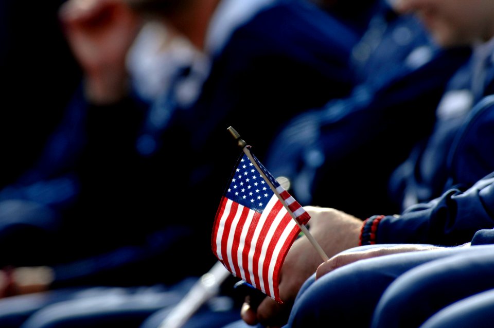 Flickr - Official U.S. Navy Imagery - An athlete for Team Navy-Coast Guard holds an American flag during the opening ceremony for the second annual Warrior Games