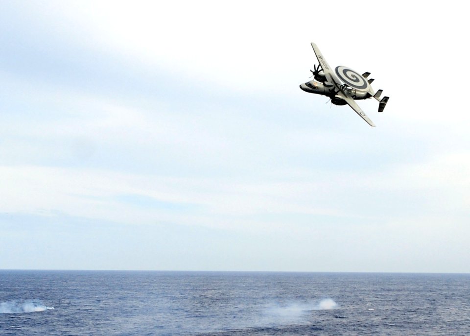 Flickr - Official U.S. Navy Imagery - An E-2C flies above USS Enterprise. (1)