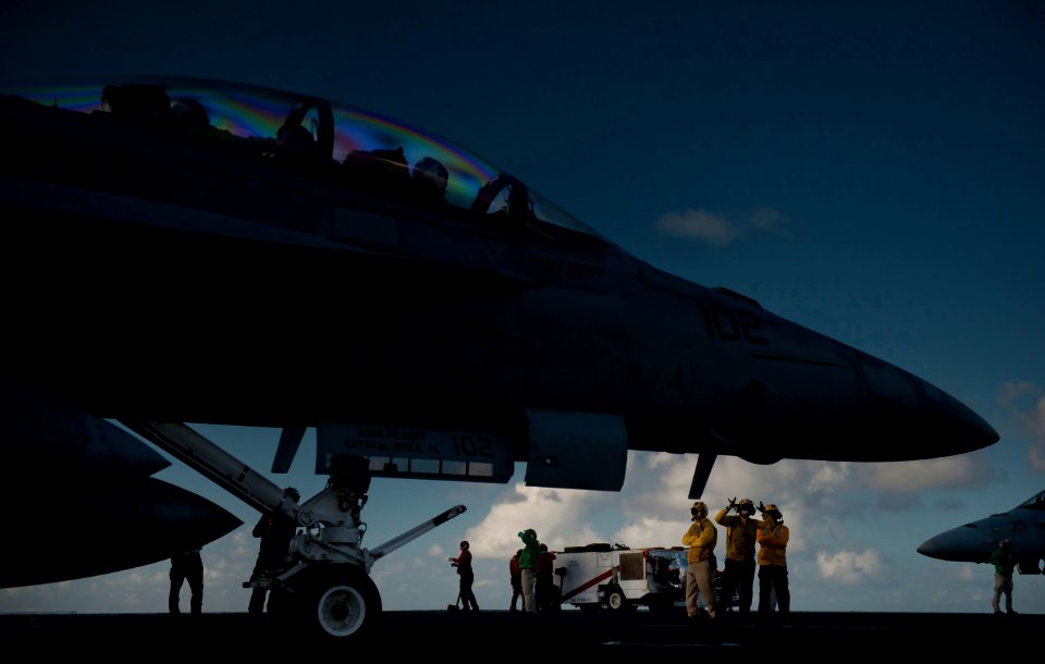 Flickr - Official U.S. Navy Imagery - Aircraft directors position jet for launch.