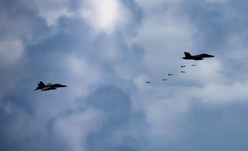 Flickr - Official U.S. Navy Imagery - An F-A-18F Super Hornet drops inert ordnance during an air power demonstration