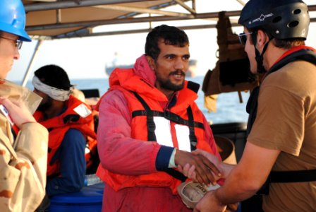 Flickr - Official U.S. Navy Imagery - An Iranian mariner greets a U.S. Coast Guardsmen.