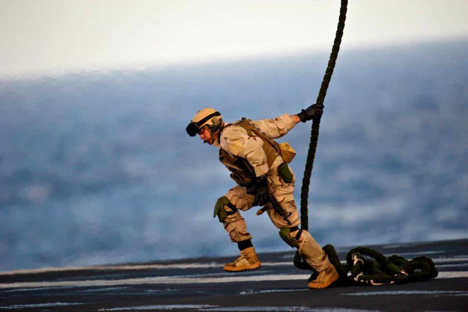 Flickr - Official U.S. Navy Imagery - An explosive ordnance disposal technician demonstrates fast roping.