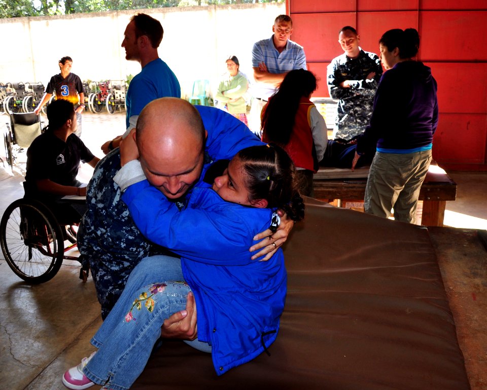 Flickr - Official U.S. Navy Imagery - An Officer assists a physical therapy patient.